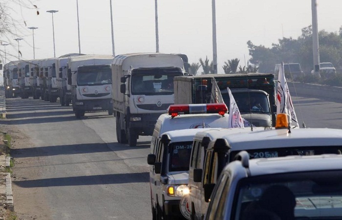 In besieged Syrian city, hungry residents sell gold for food